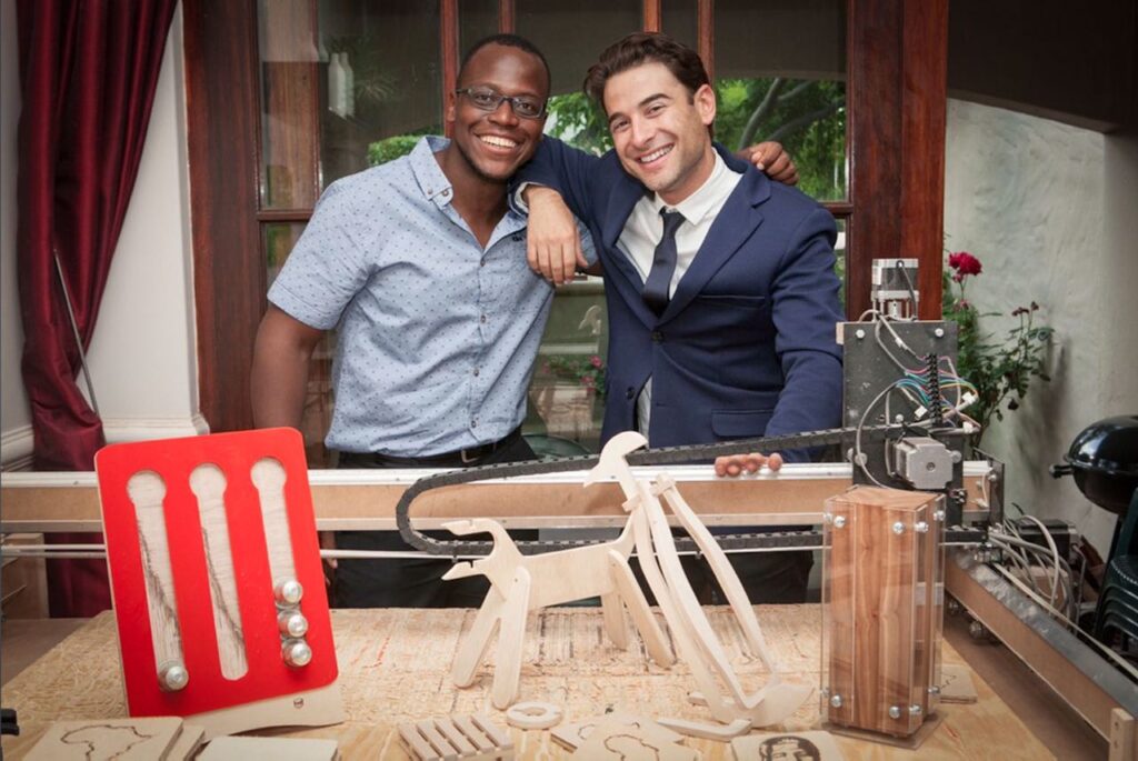 Vusani Ravele and Gil Oved from, Shark Yank SA, standing together over Native Decor products.